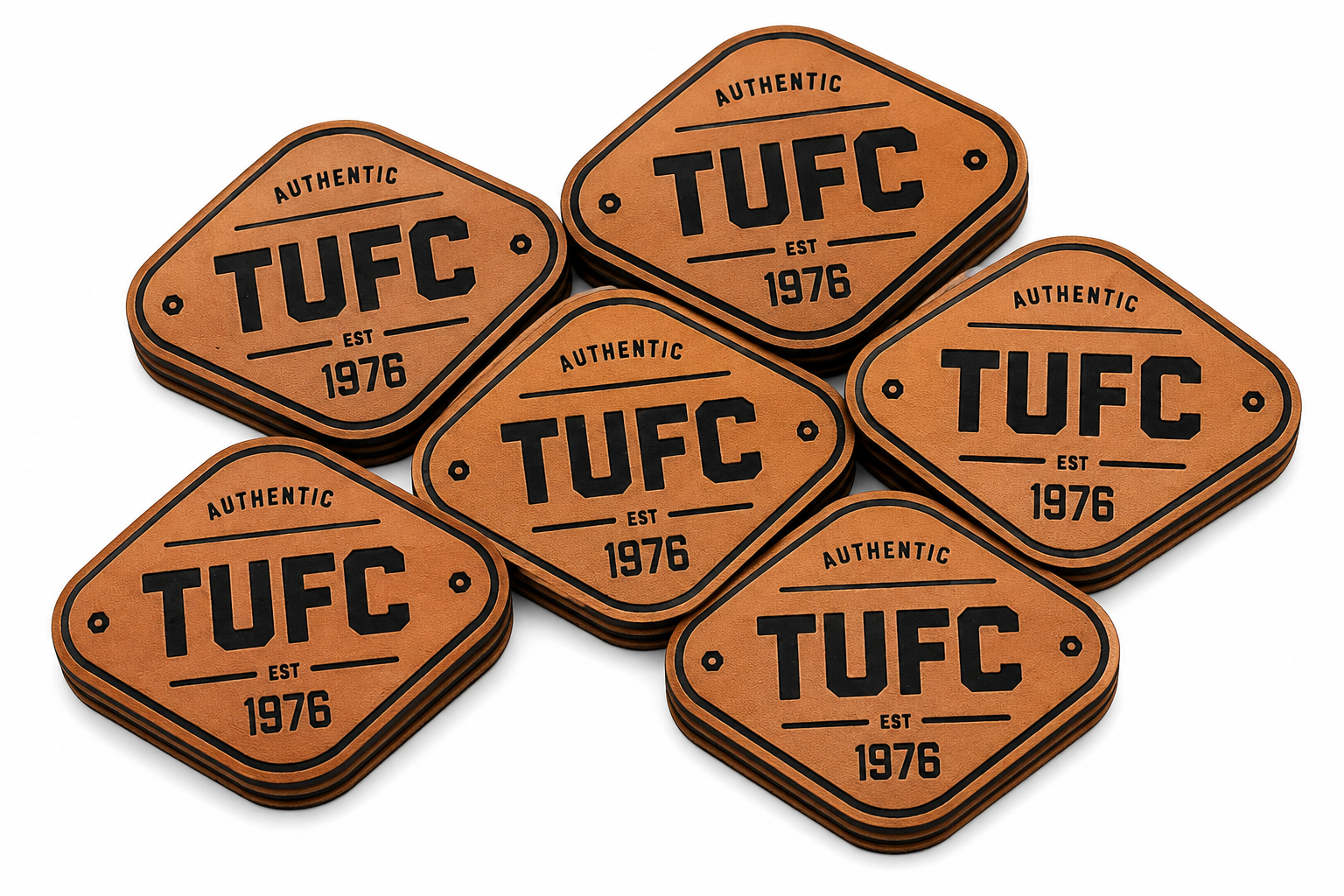 Stack of leather embossed patches — TUFC Est 1976